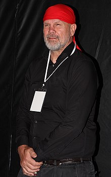 FitzSimons wearing trademark Red bandanna at a film premiere, February 2013