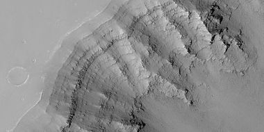 Close view of layers in Louros Valles, as seen by HiRISE under HiWish program. Note this is an enlargement of a previous image.