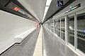 Empty Santa Rosa station on the Barcelona Metro shows a long line of platform screen doors (PSDs)