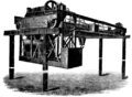 Steam-powered overhead crane from ca. 1890. Three separate, two-cylinder engines provided transverse, longitudinal, and hoisting motion; a feature of the design was the ability to raise or lower the load while in transit.[7]