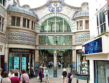 Elaborately decorated shopping mall with stained glass windows