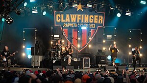 Clawfinger performing in 2024.