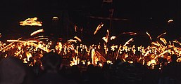 6 – Setting Fire to the Galley. After the singing of the Up Helly Aa song, the guizers throw their torches into the galley.