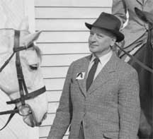 Vladimir S. Littauer at a riding clinic he conducted at Sweet Briar College in February 1953. The photo was probably taken by the Public Relations office of the college. The negative of this photo was discovered in the photographic archive of Sweet Briar College in the fall of 2009 by SBC librarian Liz Kent Leon. It was scanned by SBC assistant professor of Studio Art, Paige Critcher, in October 2009.