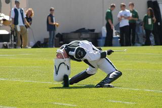 Drum Major Ian McNabb performing the traditional backbend during pregame