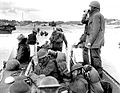 Canadian reinforcements going ashore from a (LCA) Landing Craft Assault from HMCS Prince Henry off the Normandy bridgehead. The distinctive shape of the "Invasion Helmet" (Mk III Steel Helmet) is easily discerned. Juno Beach, 6 June 1944.