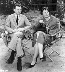 Harper Lee (right) with producer Alan J. Pakula in a 1962 publicity photo for the film of To Kill a Mockingbird