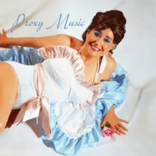 Linda Thompson lying on the ground and looking up at the camera, wearing a pink and blue frilly leotard in the style of the cover of Roxy Music's debut album.