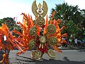 A costumed carnival dancer.