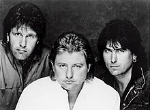 Emerson, Lake & Powell, 1986. L-R: Keith Emerson, Greg Lake, and Cozy Powell.