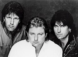 Emerson, Lake & Powell, 1986. L-R: Keith Emerson, Greg Lake, and Cozy Powell.