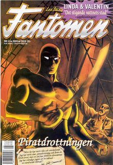 Comic-book cover, with the Phantom holding a sword