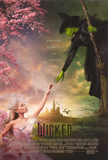 The poster mimics Michelangelo's The Creation of Adam and is pink on the left and green on the right. Glinda is in the bottom left in a pink dress, reaching up to Elphaba, who's in the top right in a black dress, witch's hat and on a broomstick, reaching down to Glinda. In the middle, both hands are outstretched but not touching, and the film's tagline is written in white text on separate lines: "Everyone deserves a chance to fly". The landscape of the Land of Oz is in the background.