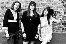 A promotional shot of the band in 1992. (L-R: Lori Barbero, Kat Bjelland, and Maureen Herman)