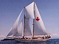 The Canadian schooner Maple Leaf, traditionally rigged, with a gaffed foresail, a square fisherman, and Marconi (fore-and-aft) main, staysail and jib.