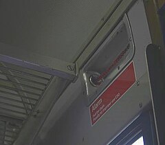 British train alarm, near car ceiling