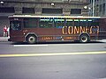 Bus 1516, a 2003 Gillig "Phantom" with the "Connect" design picking up passengers at 7th Avenue and William Penn Place.