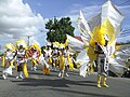 A costumed carnival dancer.