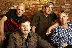 Petra members before disbanding in 2006 (l–r): Greg Bailey, Bob Hartman, John Schlitt, Paul Simmons