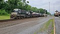 GE AC44C6M #4046 leads a manifest on track 2, with the Central of Georgia Railway heritage unit, GE ES44AC #8101, trailing