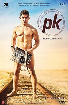 Aamir Khan, as the title character PK, playing a tuba