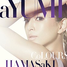 A face portrait of a woman (Ayumi Hamasaki), holding her hand above her head. The title "Colors" and artist title is seen above and below.