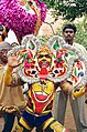 A lion dancer from a local festival.