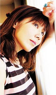 Ritsuko Okazaki on the cover of her album Love & Life (2005).