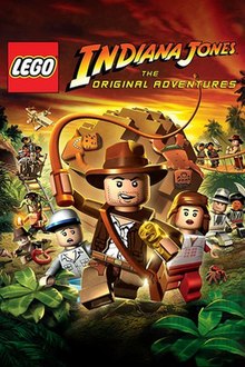 The LEGO logo is to the left of the game's word mark, both of which are at the top of the image. Below the word mark is a Lego minifigure wearing a brown fedora hat and a jacket, wielding a light brown whip. Behind the minifigure is a large ball of Lego blocks rolling after the character as he runs through a jungle scene.